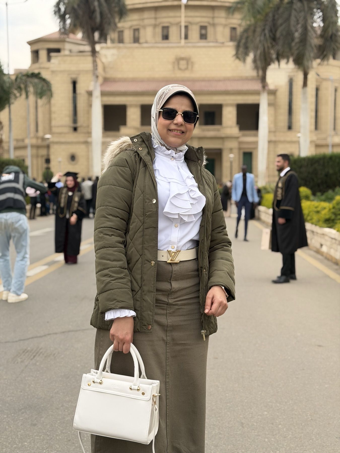 Manal on the Cairo University campus in front of the main dome